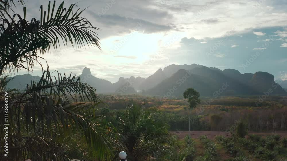 Tourist is spending her holidays in a luxury resort in thailand, enjoying the warm weather and the beautiful landscape Tourist is spending her holidays in a luxury resort in thailand, enjoying the warm weather and the beautiful landscape