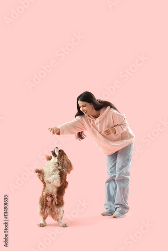 Beautiful young woman playi...