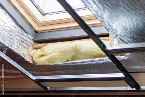 Foto Installing skylight windows in mansard garret, or attic