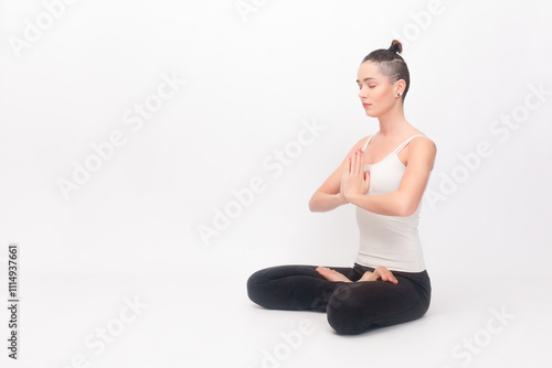 Young woman doing yoga exercise photo