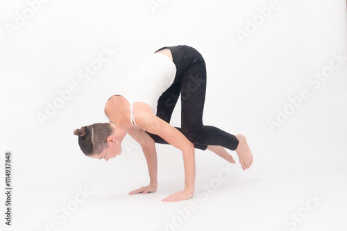 Young woman doing yoga exercise photo