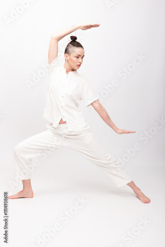 Young woman doing yoga exercise photo