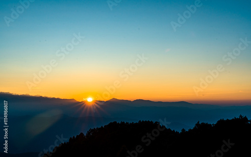 Landscape view of gloomy Sunrise over the mountian in  Sailung, Nepal. photo