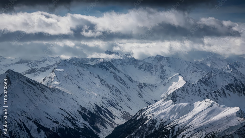 Fototapeta premium Intense Aerial Perspective of The Alps, France/Switzerland Aerial view of The Alps under heavy clouds
