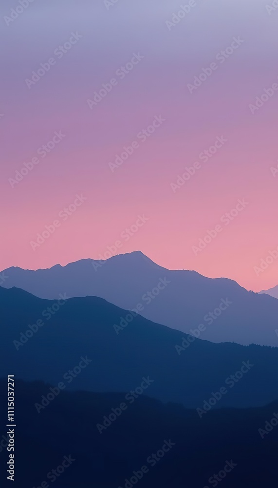 Obraz premium Silhouetted Mountains at Pink Sunset Sky