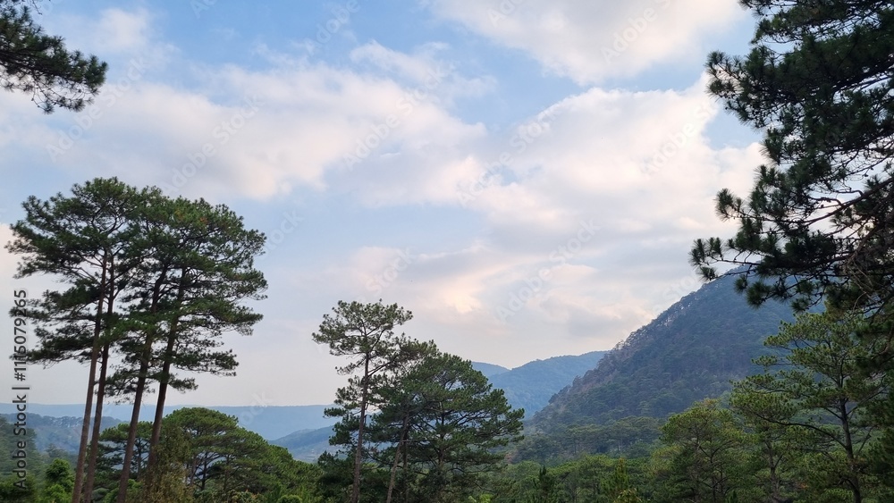 Obraz premium time clouds over the mountains