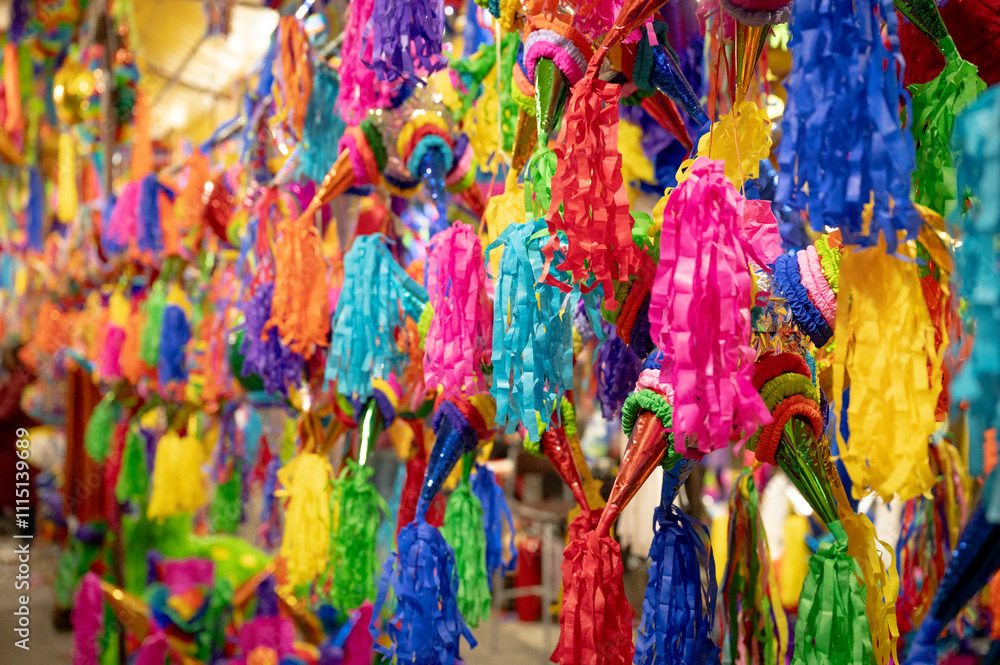 Fototapeta premium Piñatas season in a Mexican market, piñata background in christmas