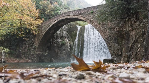 Palaiokarya Stone Bridge and Waterfall in Trikala Greece, Landscape Animation, Autumn Colors photo