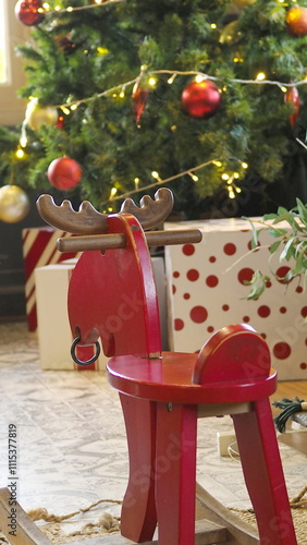 Christmas tree close-up background with sparkle.and glowing bokeh lights on a vibrant red background