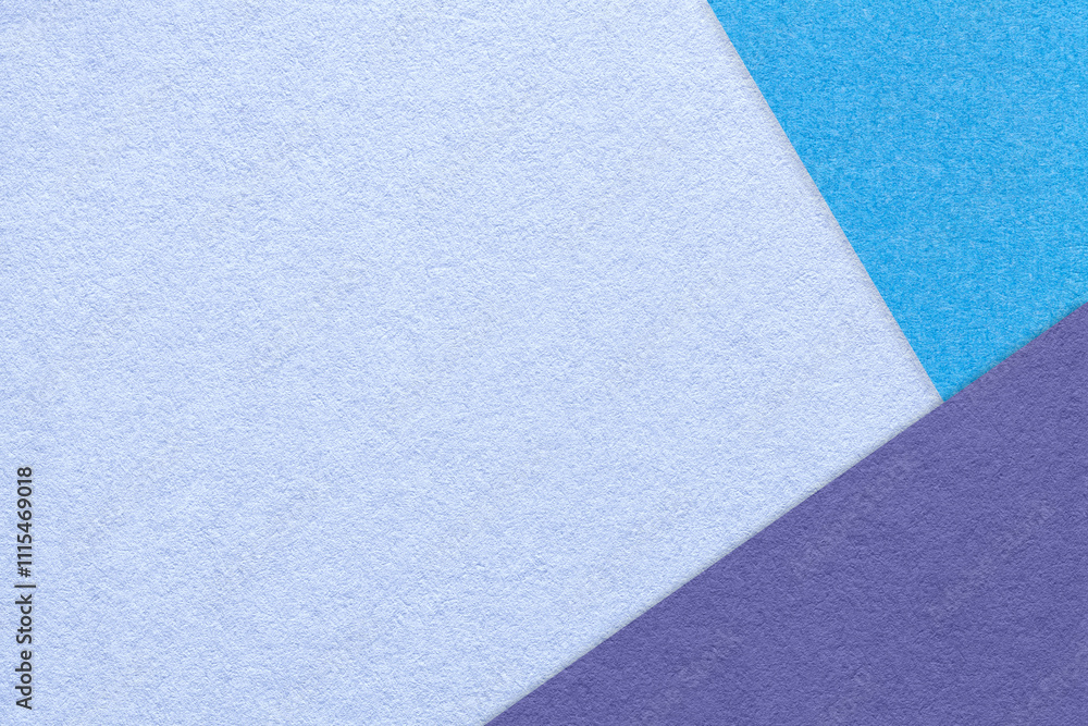 Texture of craft very peri color paper background with blue and violet border. Vintage abstract cardboard. Texture of craft very peri color paper background with blue and violet border. Vintage abstract cardboard.