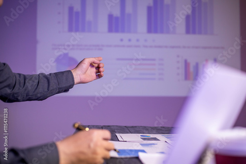A businessman has prepared a plan and put it on the table to present the work in the meeting room to his colleagues to have consistent and appropriate opinions and agreements for the work.