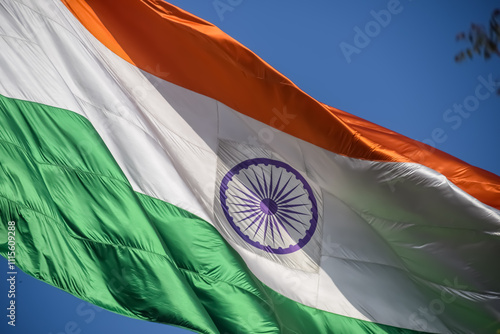 India flag flying high at Connaught Place with pride in blue sky, India flag fluttering, Indian Flag on Independence Day and Republic Day of India, tilt up shot, Waving Indian flag, Har Ghar Tiranga