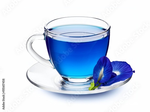 Glass cup of organic blue butterfly pea flower tea (blue pea, bluebellvine, cordofan pea, clitoria ternatea) isolated on white background.