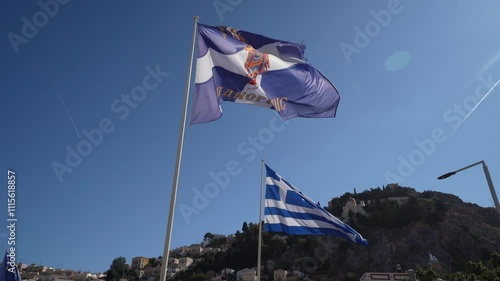 waving greek flag on a sunny day