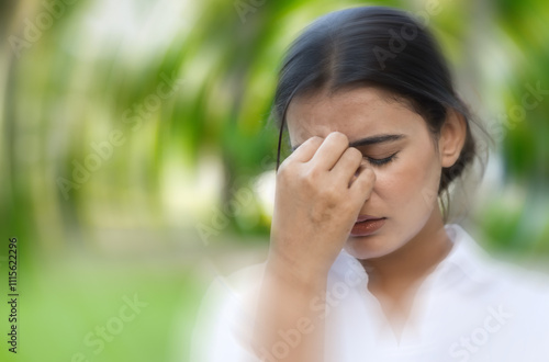 South Asian woman suffering from migraine, vertigo, dizziness, headache, stress, stressful lifestyle, fatigue, overwork, mental fatigue, life problem