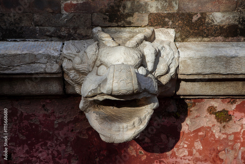 The dragon head on the Tibetan watchtower in the Four Great Regions scenic area of Summer Palace in Beijing. photo