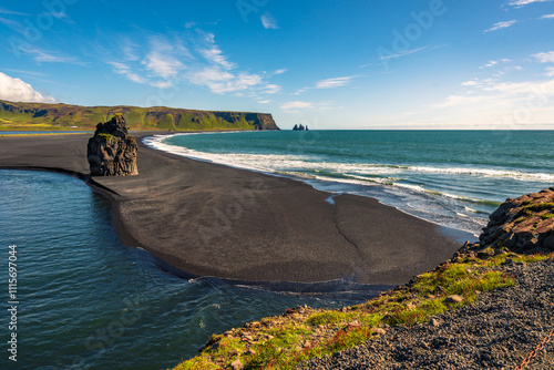 Waves at beautiful black volcanic sand beach in Vik Iceland