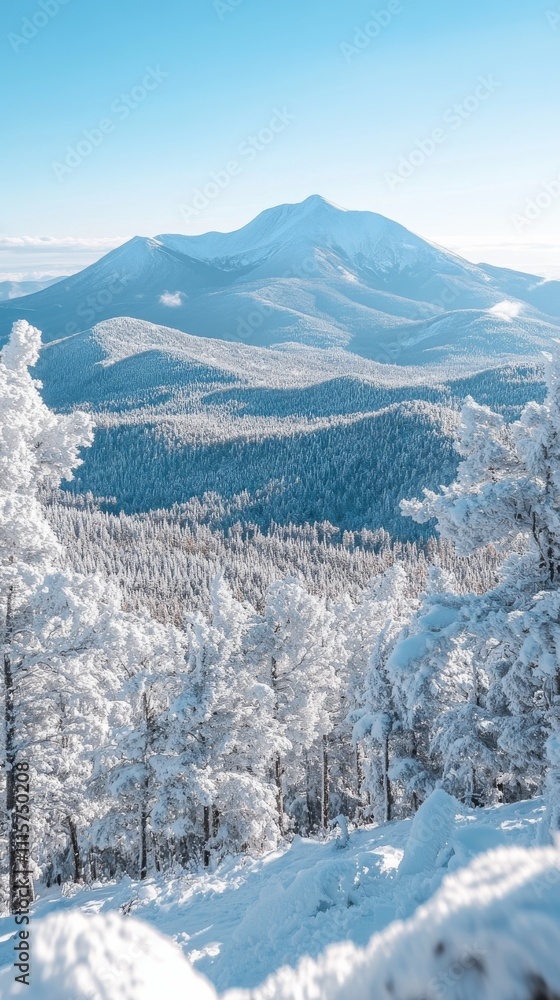 Obraz premium Snowy mountain landscape with serene winter scenery in daylight