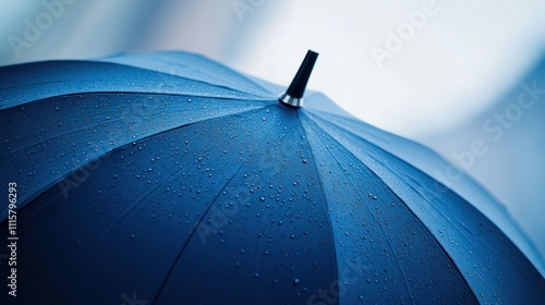 A branded umbrella with a sleek, modern design, featuring the company logo on the canopy.
