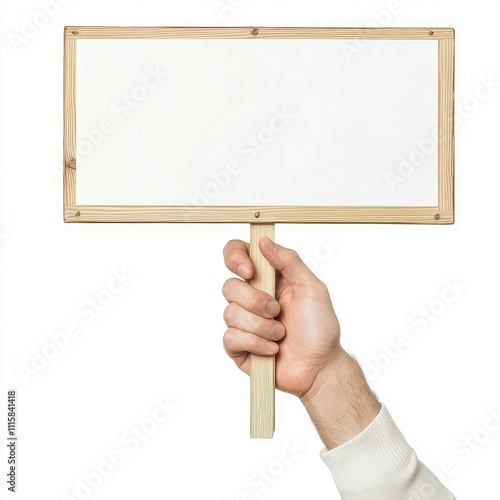 A hand holding a blank wooden sign, ready for messages or announcements. photo