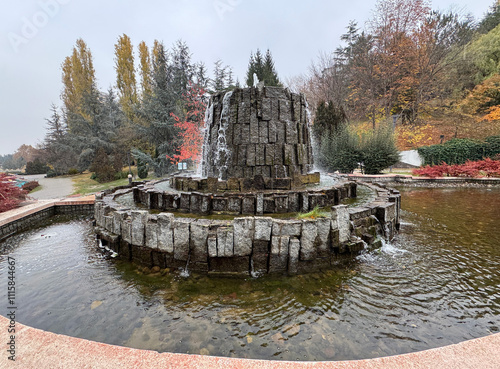 Beautiful view of Dikmen Valley, Dikmen Valley in Ankara, Turkey. Thousands of trees, decorative waterfall, rocks, water fountains in the big ornamental pool. A beautiful autumn view. photo