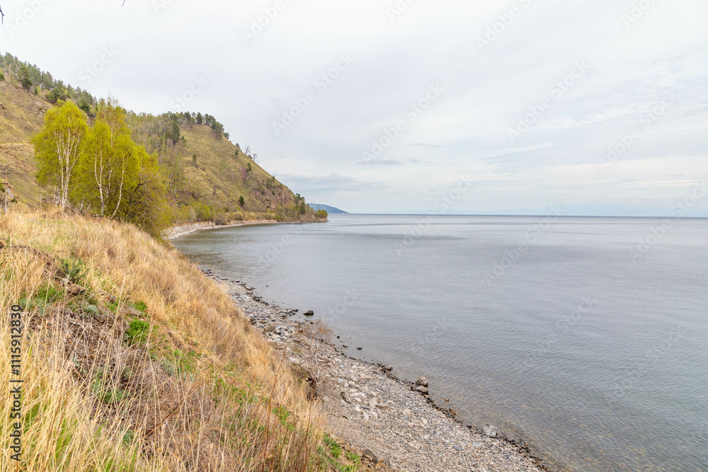 Obraz premium Beautiful panoramic landscape with shore of Lake Baikal. Listvyanka village, Irkutsk region, Russia.