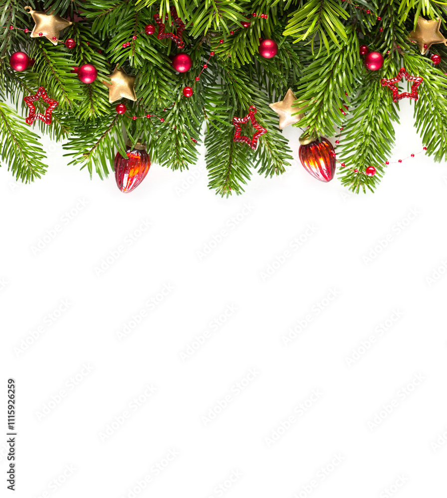 Fir branch with Christmas ornaments isolated on white background. Flat lay. New Year holiday background.