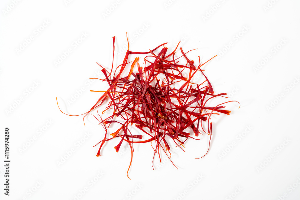 Naklejka premium Dried bright red saffron isolated on white background.