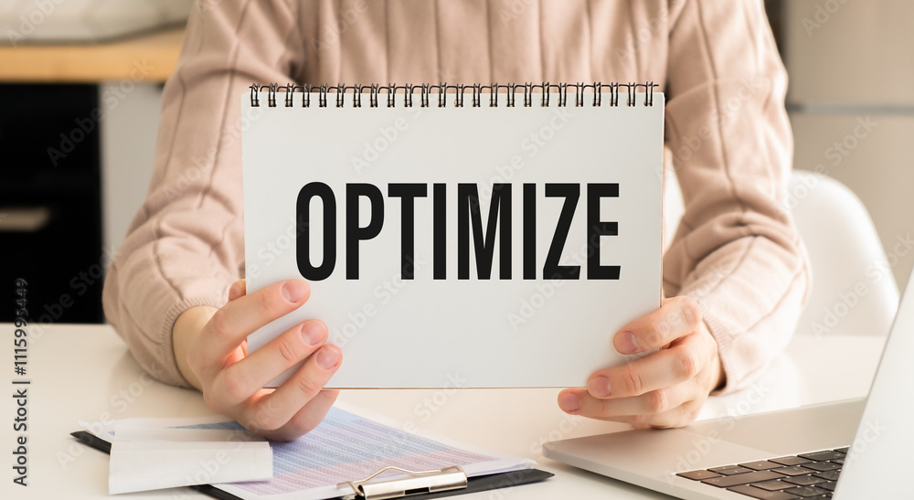 Optimize handwritten with white notepad in hands woman Optimize handwritten with white notepad in hands woman