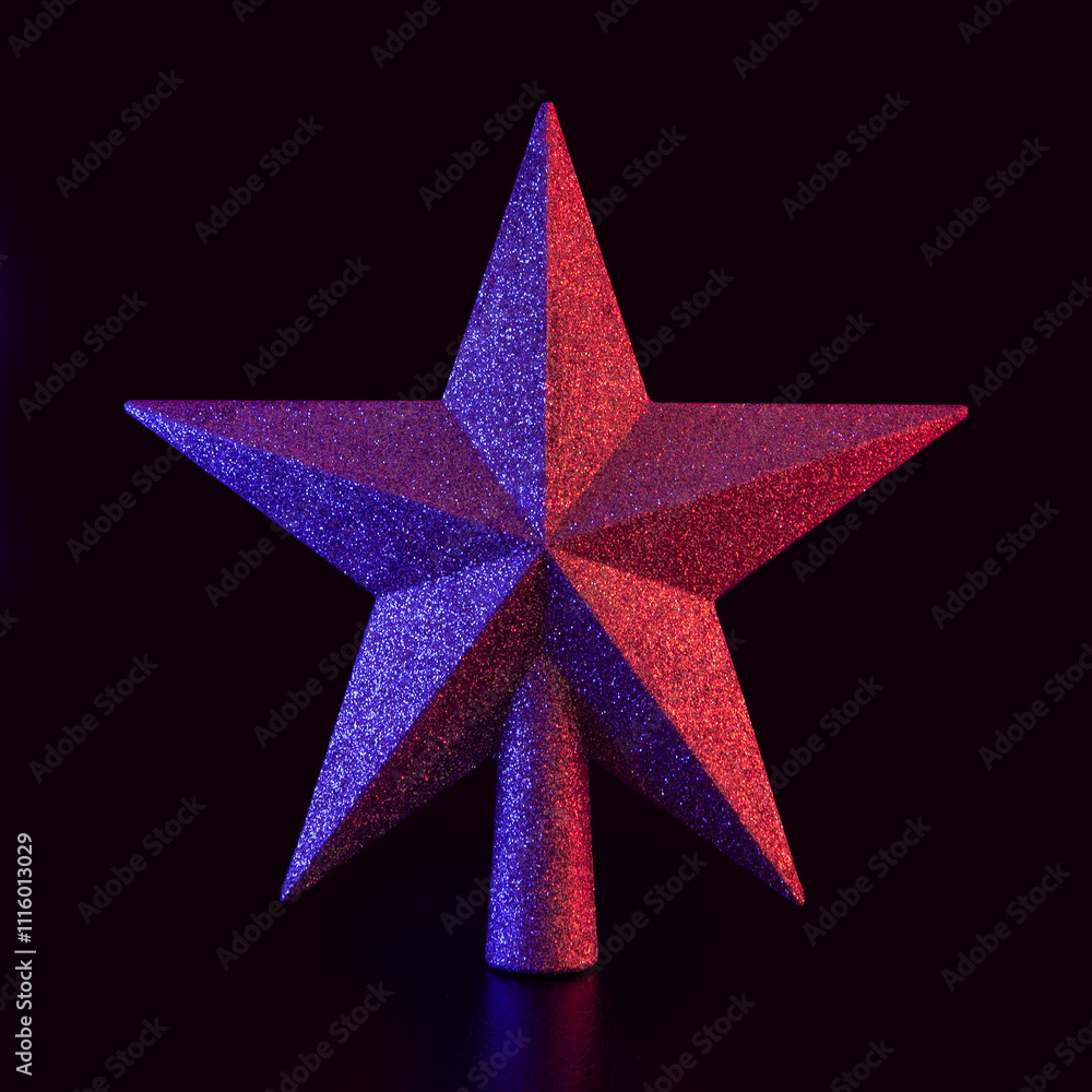 Obraz premium christmas star decoration with neon glowing colors on black background