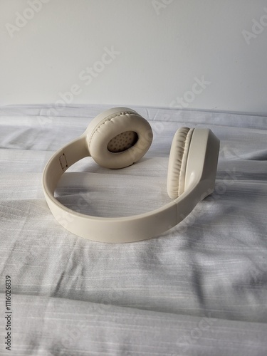 vireless minimalist elegant beige headphones photo