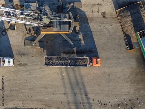 Aerial View of Cargo Truck Loading Sunflower Seeds in Port Facility with Industrial Equipment