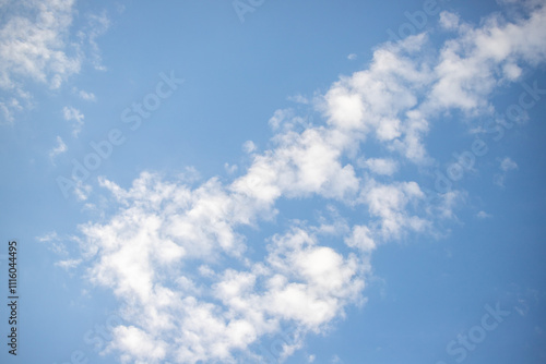 Sky background with clouds. White clouds against a blue sky.