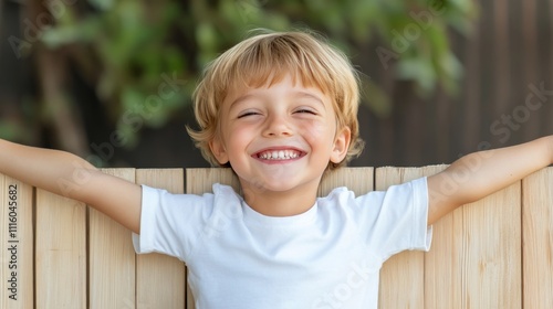 Happy child enjoying a sunny day outdoors with arms wide open