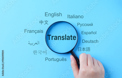 Translation and Multilingual Communication Concept. A magnifying glass highlights the word 