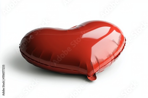 Heart shaped balloon resting on a white surface, symbolizing love and affection