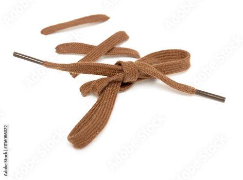 knotted shoelace on a white background photo