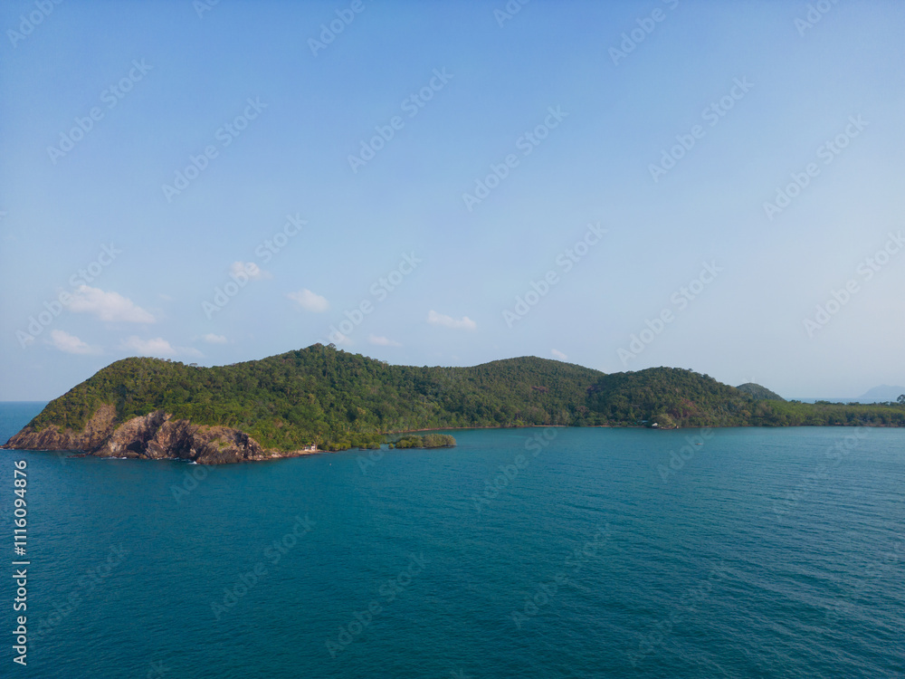 Fototapeta premium Aerial view exotic tropical island sea beach green forest blue sky with cloud