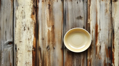 Empty beige plate centered on rustic wooden background, ideal for showcasing culinary presentations, restaurant menus, or home dining settings, minimalistic, food photography, tableware. photo