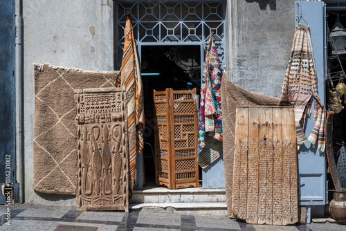 Tangier, Tanger, Morocco : facade of a handicraft shop. Wooden artefacts.