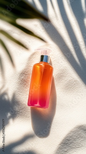 A striking orange bottle with a shiny cap positioned elegantly on textured sand, accented by dramatic lighting and palm shadows, exuding an elegant summer vibe.