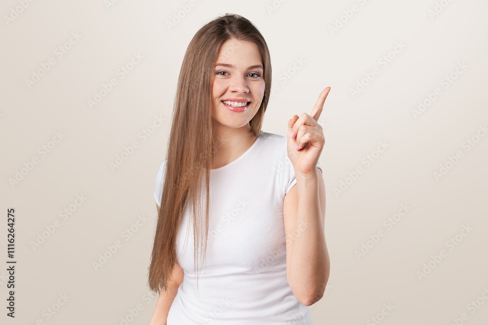 Beautiful young woman point finger to the side Beautiful young woman point finger to the side