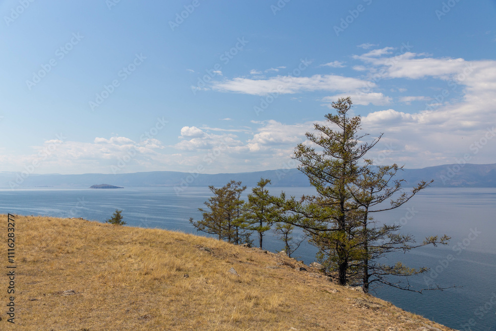 Beautiful view from the shore of Lake Baikal near Maly Khuzhir village. Baikal lake, Olkhon island, Irkutsk region, Russia Beautiful view from the shore of Lake Baikal near Maly Khuzhir village. Baikal lake, Olkhon island, Irkutsk region, Russia