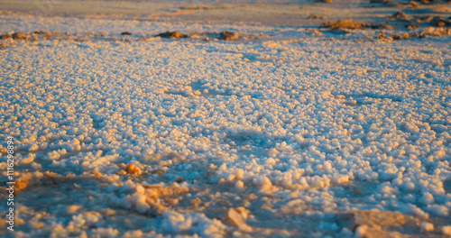 Salt remains of large endorheic salt lake Chott el Djerid in Tunis. Deserted lake because of weather arid conditions. photo