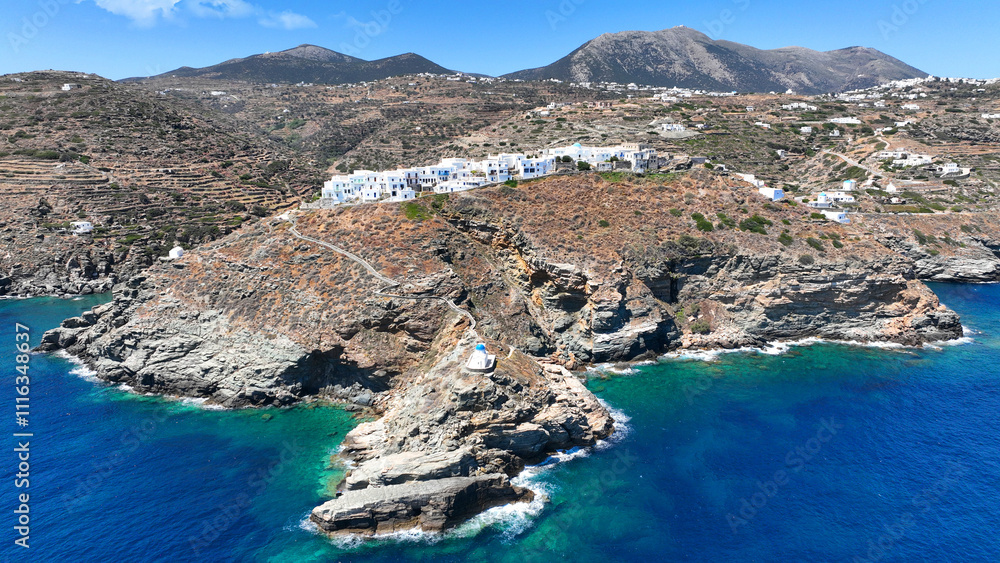 Aerial drone photo of scenic cliff-top village of Kastro or Castle built in a rock overlooking the eastern coast of the island inhabited since the prehistoric period, Sifnos island, Cyclades, Greece