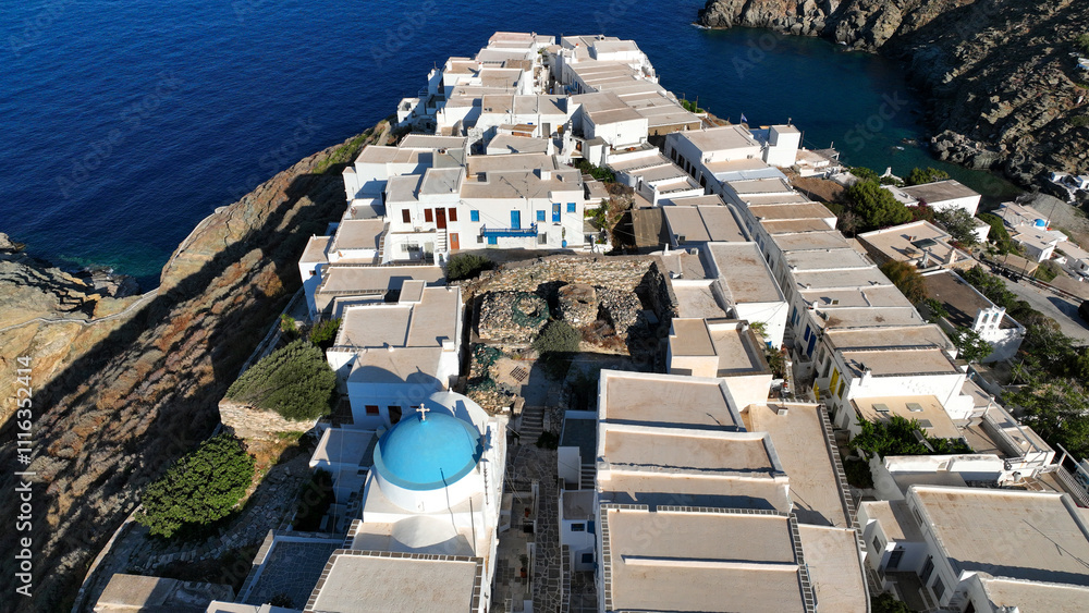 Aerial drone photo of scenic cliff-top village of Kastro or Castle built in a rock overlooking the eastern coast of the island inhabited since the prehistoric period, Sifnos island, Cyclades, Greece