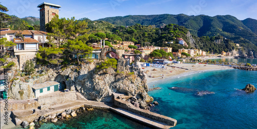 Fototapeta Naklejka Na Ścianę i Meble -  Italy, Cinque terre national park. Monterosso al mare village , beautiful summer destinaltion with stunning beaches and scenic views. Aerial drone panoramic view