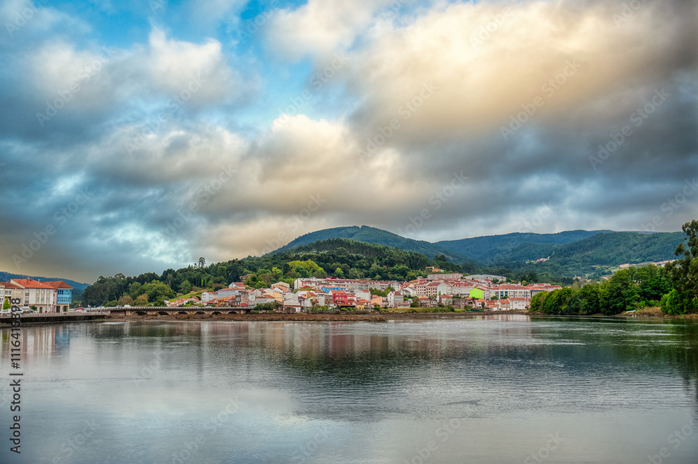 Naklejka premium Noya is a municipality and a Spanish town that belongs to the province of La Coruña, in the autonomous community of Galicia. It is located at the innermost point of the Muros and Noya estuary, Spain.