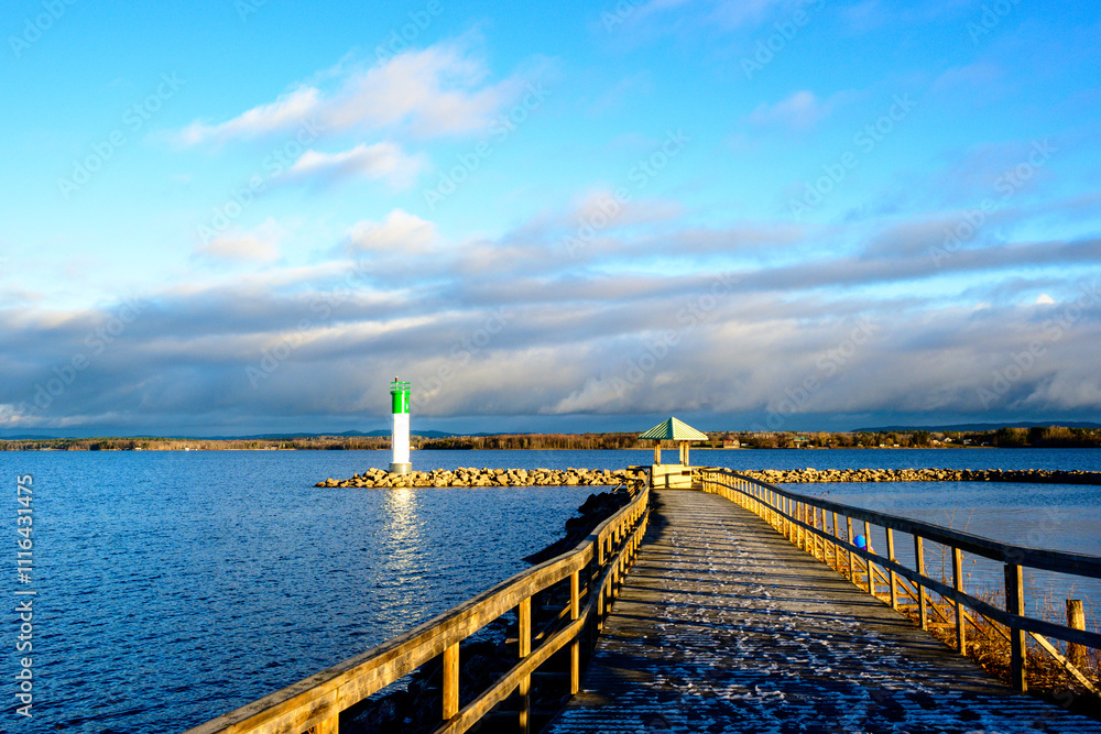 Fototapeta premium Sunrise seen from the Pembroke Marina on the Ottawa River in fall room for text 