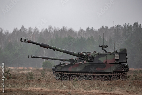 Self propelled howitzers in the field